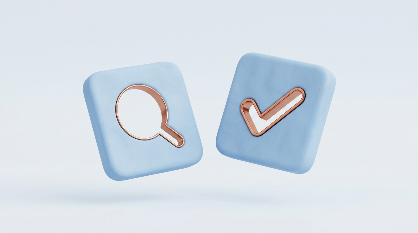 Two powder-blue clay tiles, one with a magnifying-glass cutout and one with a check mark